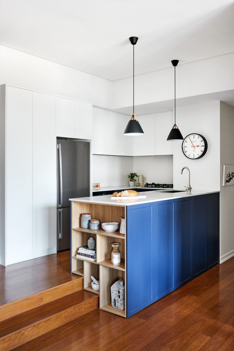 Open shelving storage kitchen island two toned blue kitchen